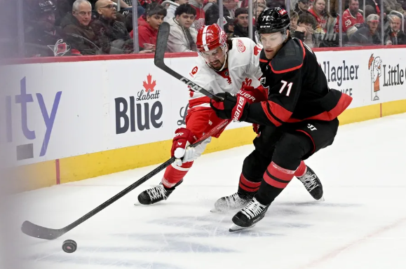 BREAKING NEWS: Jordan Martinook Puts on a Show, Racks Up Goal and Assist to Propel Hurricanes to Thrilling Victory Over Red Wings.